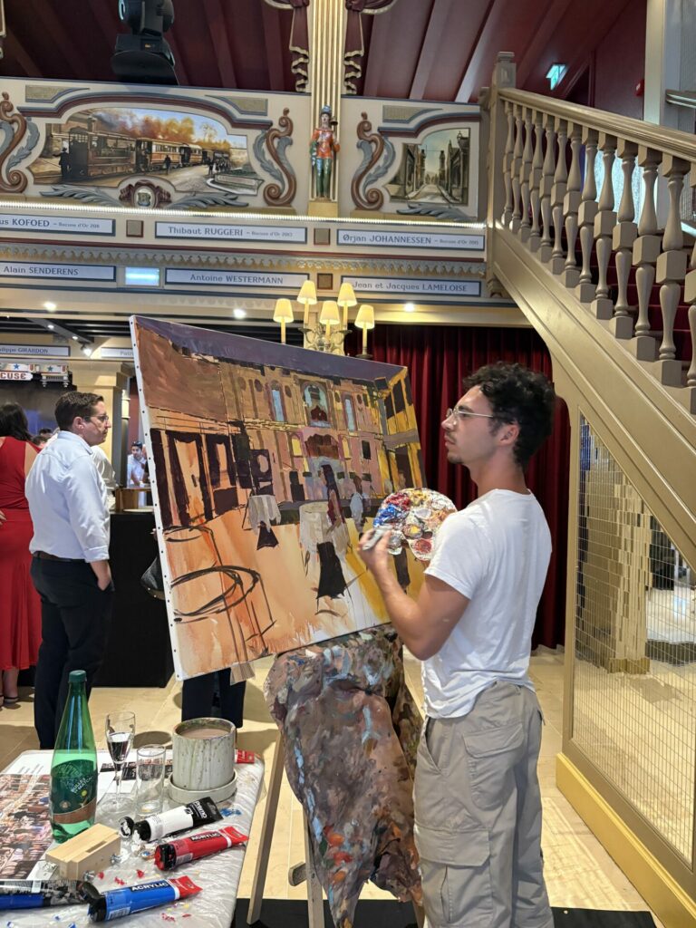 Artiste réalisant un live painting pendant la soirée des 30 ans d'Axel Gestion à l'Abbaye de Collonges, près de Lyon